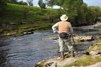 Man standing at a river